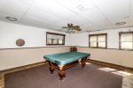 Downstairs game room with regulation pool table